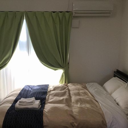 มิสเตอร์ คินโจ ไวโอเล็ต Aparthotel นาฮะ ภายนอก รูปภาพ