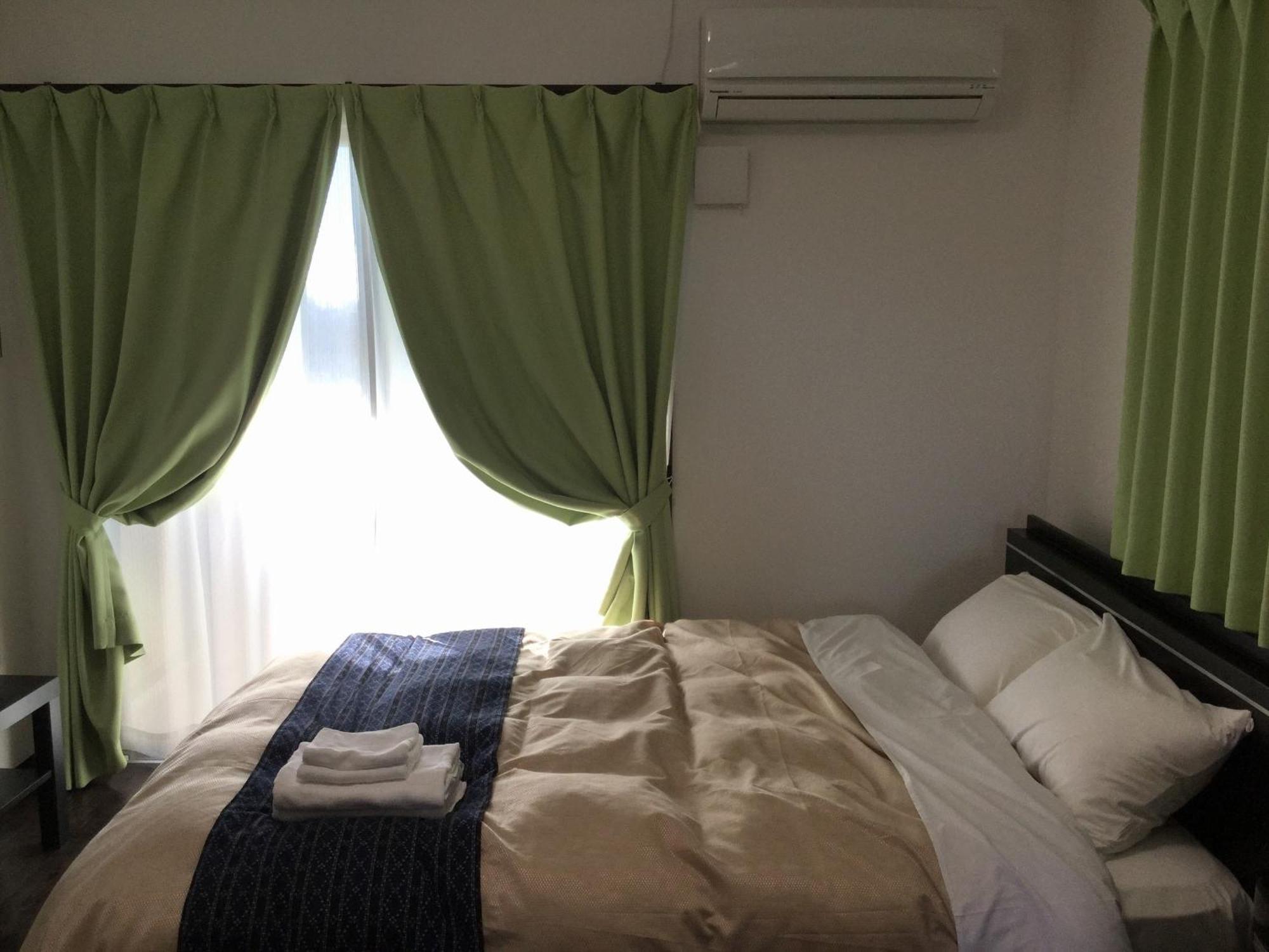 มิสเตอร์ คินโจ ไวโอเล็ต Aparthotel นาฮะ ภายนอก รูปภาพ