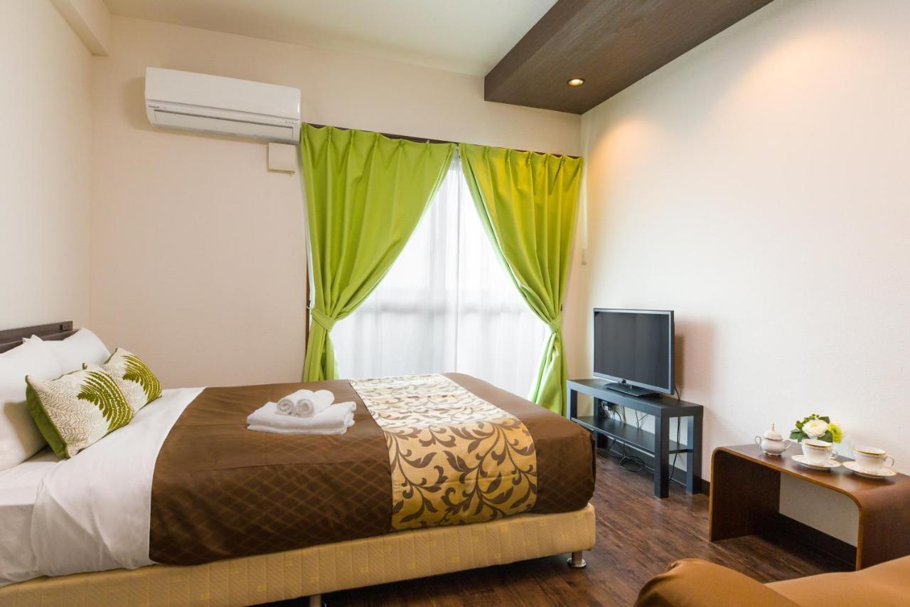 มิสเตอร์ คินโจ ไวโอเล็ต Aparthotel นาฮะ ภายนอก รูปภาพ